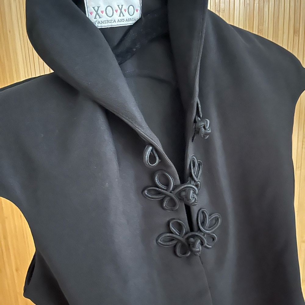 XOXO Elegant Black Vest with Unique Closures